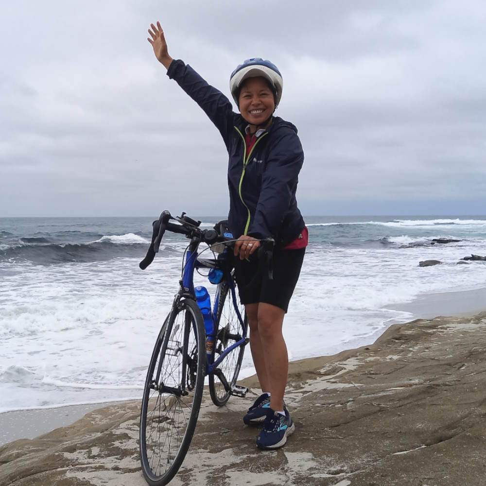 Chau Pham, Sierra Club San Diego Bike Leader wo is leading a Bike Ride at the Sierra Club San Diego 75th Anniversary Picnic in the Park